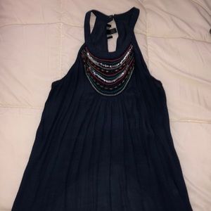 Long top with beaded neckline